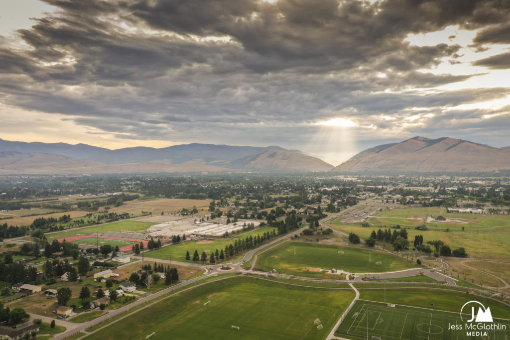 Drone image over Fort Missoula Park, Missoula, Montana, at a summer sunrise.