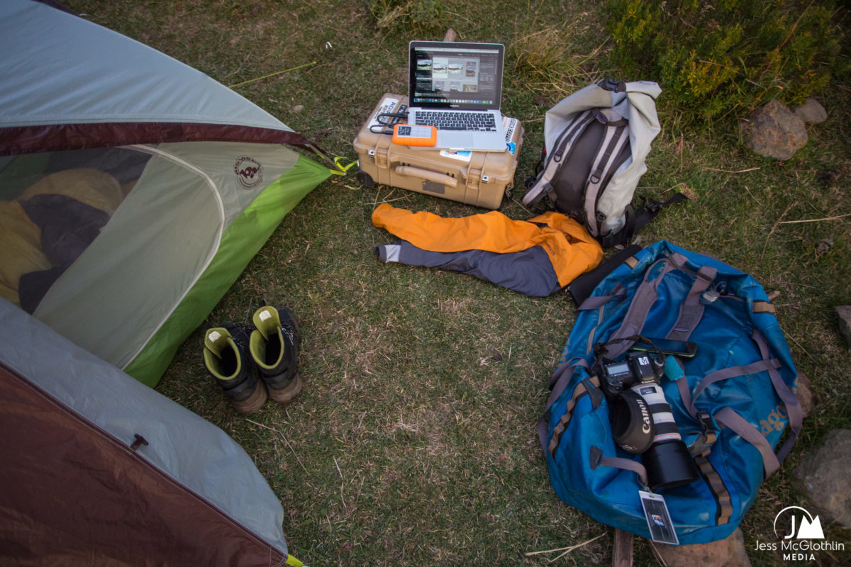 Camping work station with tent, computer, camera gear and more with working photographer Jess McGlothlin in Chilean Patagonia.