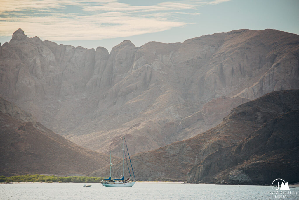 Sailboat and dinghy anchored off off Baja California Sur.